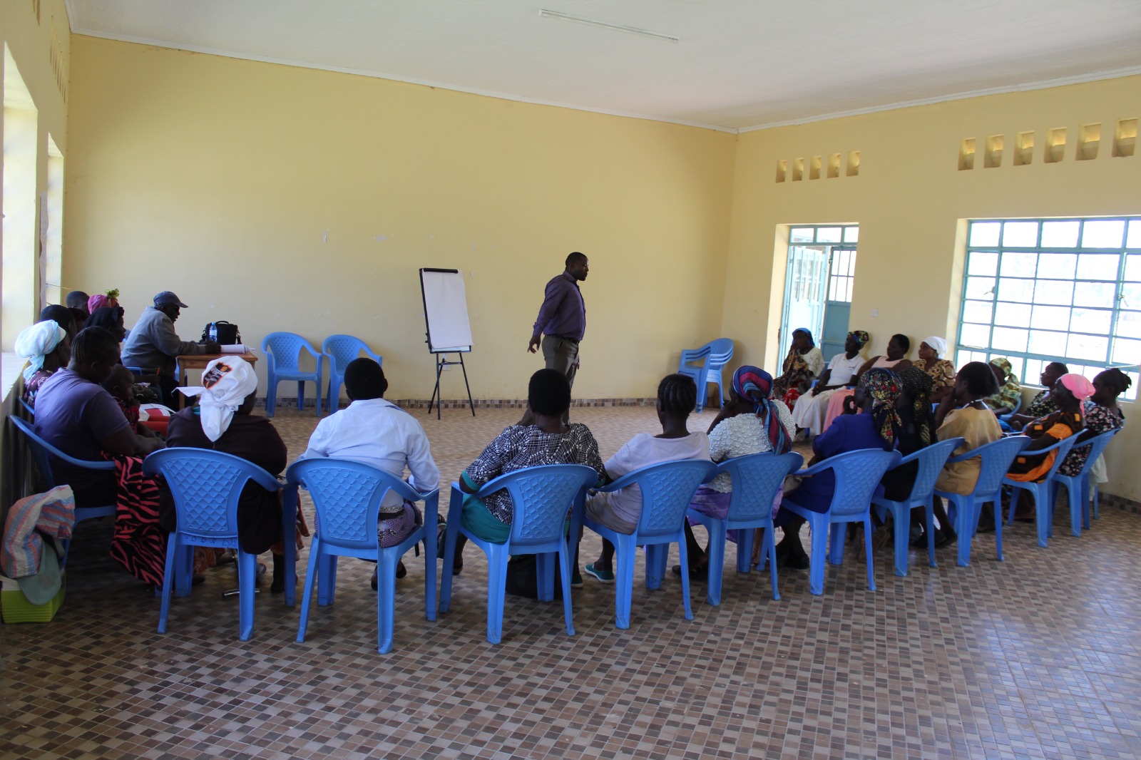 Health workers conducting community screening and awareness