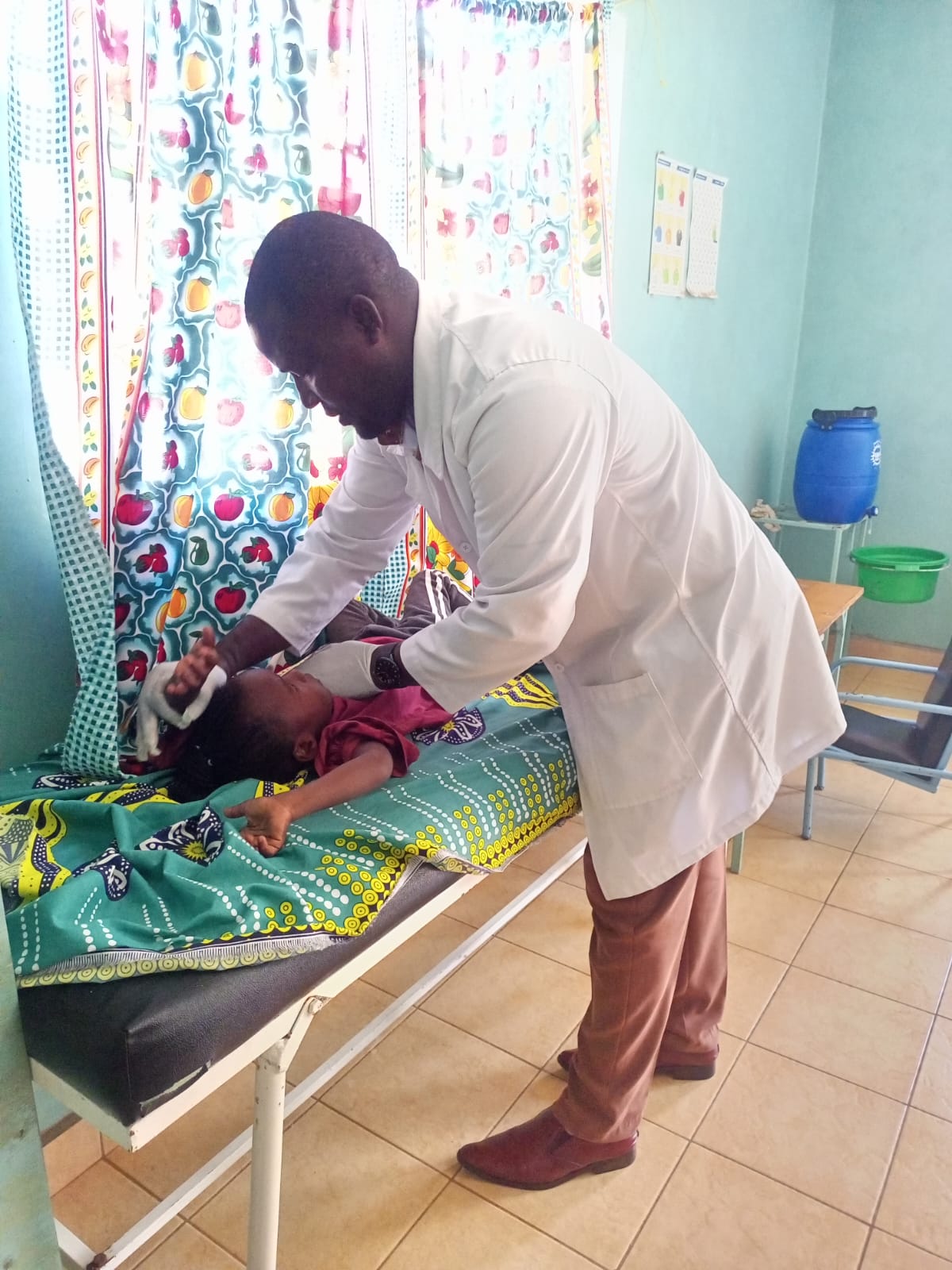 Occupational therapist helping a patient with fine motor skills