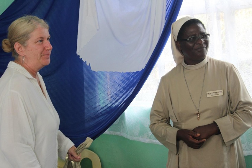 Nyabondo Centre administrator receiving visitors.